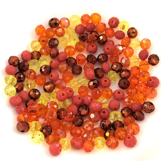 rondelle shaped jewerly beads in different shades of orange