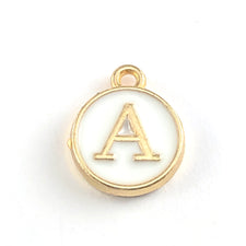 Round white and gold jewerly charm of the letter A