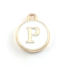 gold and white round jewerly charms with the letter P on them