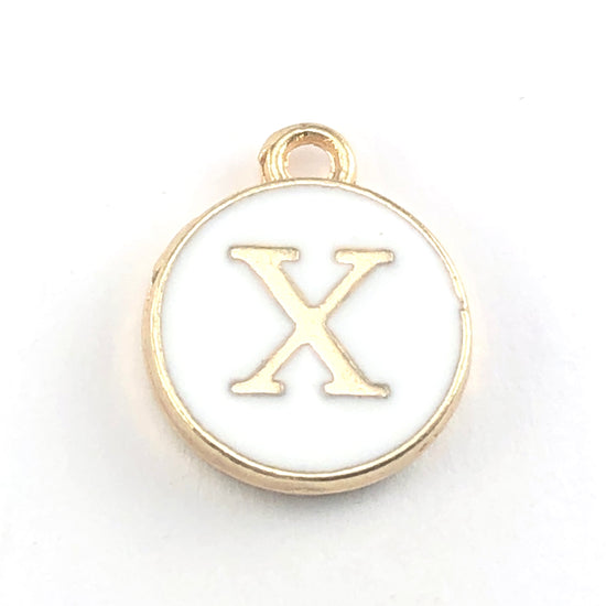 round white and gold jewerly charms with the letter X on them