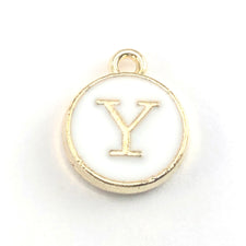 round white and gold jewerly charms with the letter Y on them