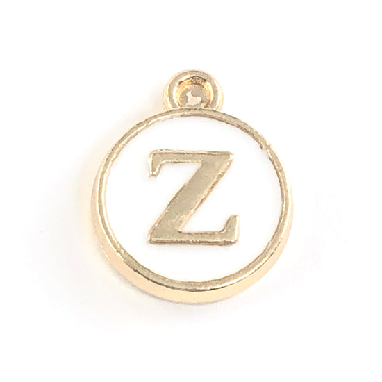 round white and gold jewerly charms with the letter Z on them