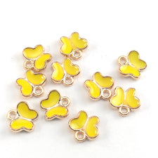 Yellow and gold butterfly shaped jewerly charms
