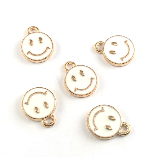 five white and gold round smile face jewerly charms