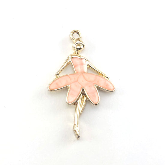 pink and gold ballerina shaped jewelry pendant