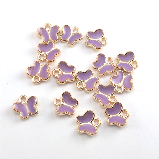 purple and gold butterfly shaped jewerly charms