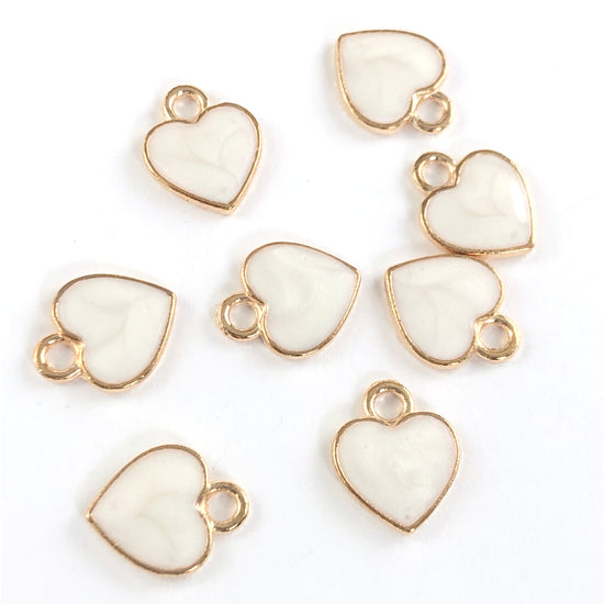gold and white colour heart shaped jewelry charms