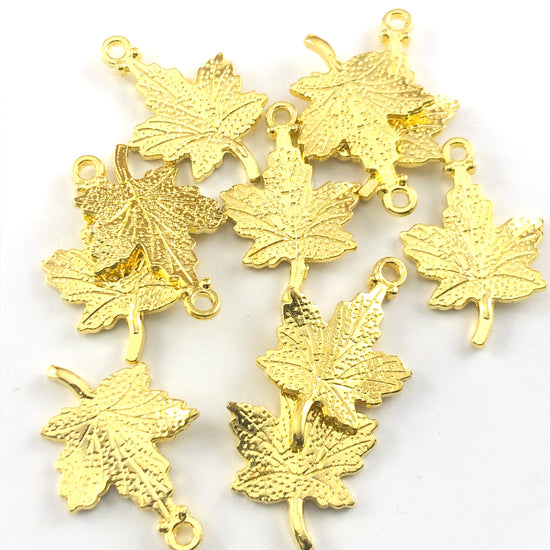 gold coloured leaf shape jewerly charms