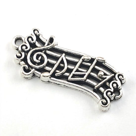 musical note shaped, silver colour jewelry charms