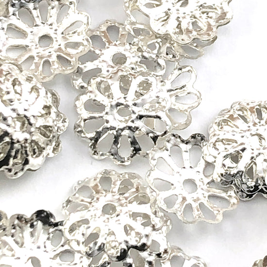 silver colour flower shaped jewelry bead caps