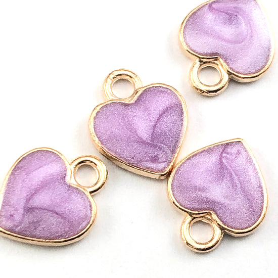purple and gold heart shaped jewelry charms