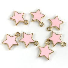 Seven pink and gold star shaped jewelry charms