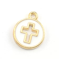 round white and gold jewelry charm with a cross cutout