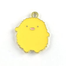 yellow and gold jewerly pendant charm in the shape of a chick