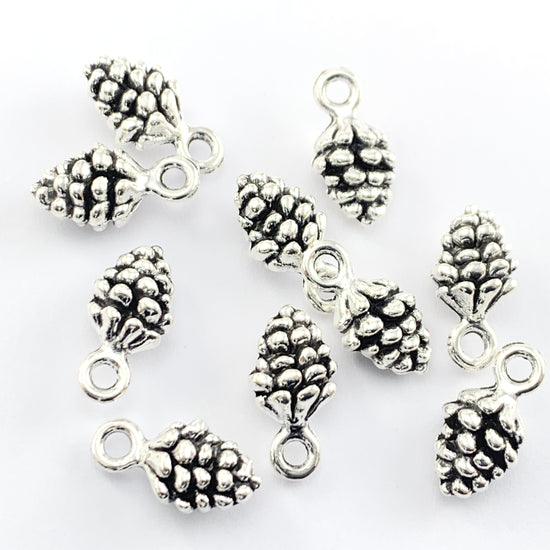 Ten silver colour pine cone shaped jewelry charms