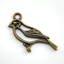 Bronze coloured bird shaped jewelry charm