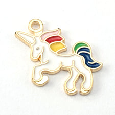 Unicorn shaped jewelry charm that is gold and white with rainbow colour mane and tail