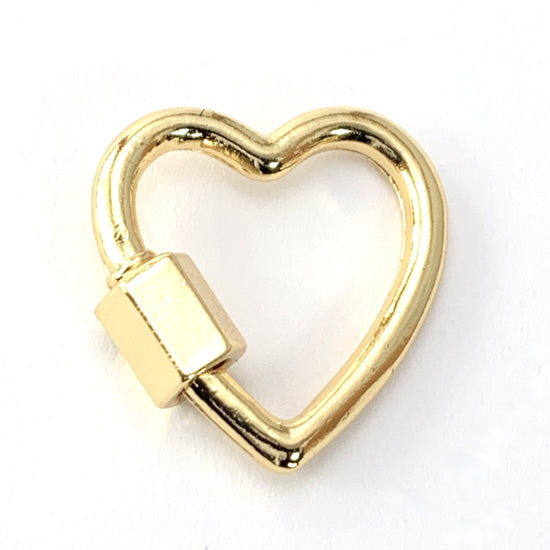 gold heart shaped jewelry pendant with a screw carabiner on one side