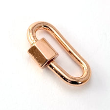 rose gold oval jewerly pendant with a carabiner screw on one side