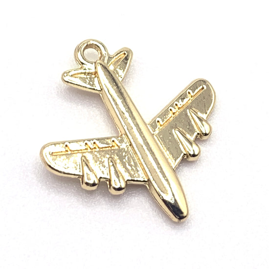 gold coloured airplane shaped jewelry charms
