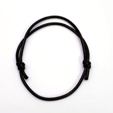 black cord bracelet with knots in it to allow adjustable length
