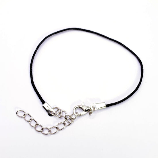 black cord bracelet with silver extender chain and lobster clasp