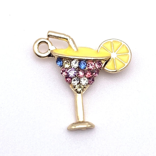 yellow and gold jewelry charms in the shape of margarita glass