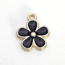 black and gold flower shaped jewelry charm