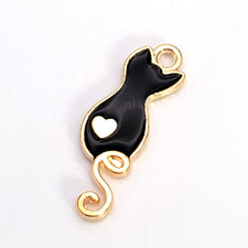 black and gold cat shaped jewelry charm