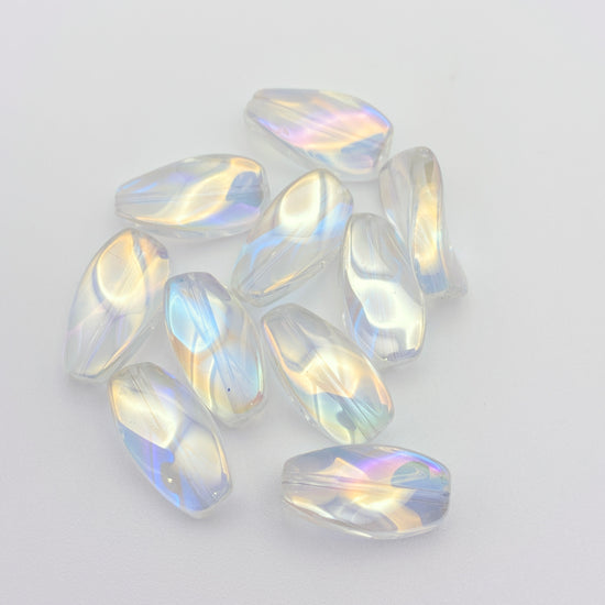 clear twisted shaped jewelry beads with a rainbow AB finish