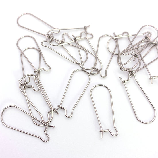 Twenty silver colour kidney shape earring hooks