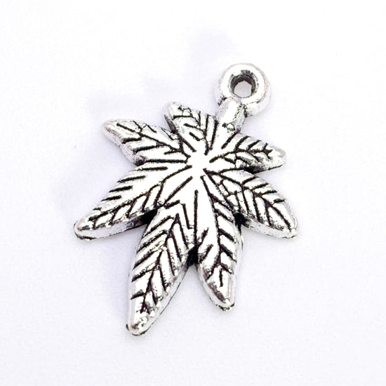 Antique silver leaf shaped jewelry charm