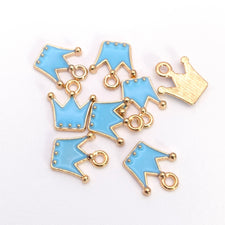 blue and gold crown shaped jewelry charms