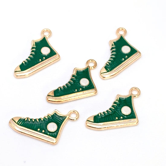 Five green and gold shoe shaped jewelry charms