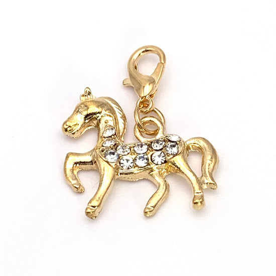 Gold colour horse shaped jewelry charms with clear rhinestones all over it