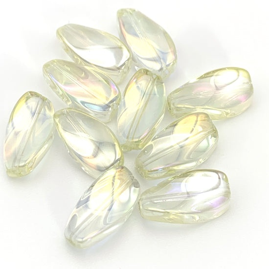 twist shaped jewerly beads that are pale yellow colour