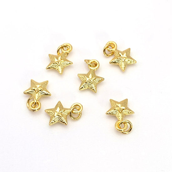 gold colour star shaped jewerly charms