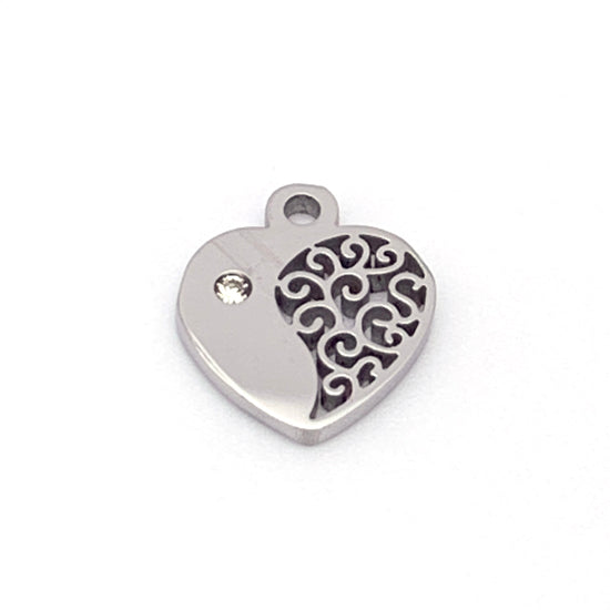heart shaped silver jewelry charm with clear rhinestone in it