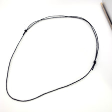 black necklace made of cord