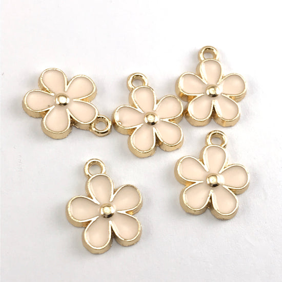 pink and gold flower shaped jewerly charms