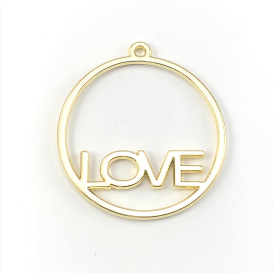 round open back bezels that have the word love in them