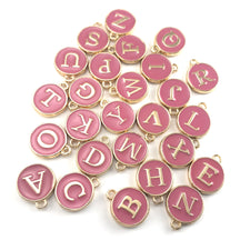 Pink and gold round letter charms