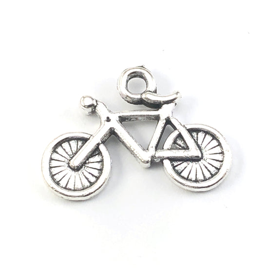 bicycle shaped jewerly charms in an antique silver finish