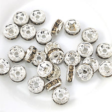 silver rondelle shaped beads with topaz rhinestones