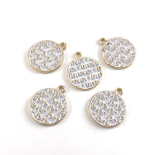 round white and gold charms with the word forever on them