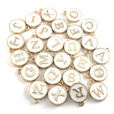 White and gold round letter charms