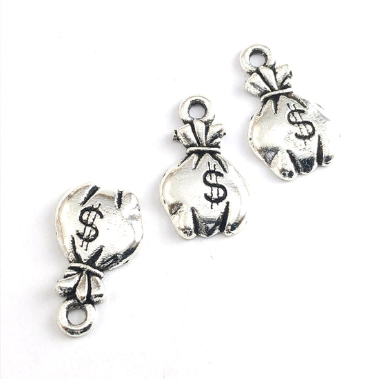 silver jewerly charms that look like money bags